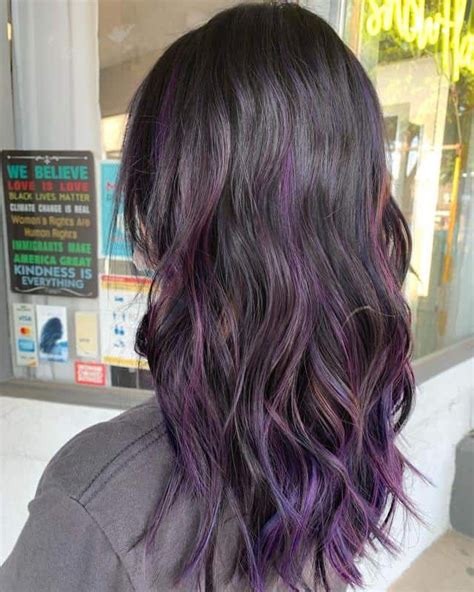 short black hair with purple highlights|black hair with purple tips.